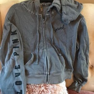 Pink sweater. Used, but in decent condition.